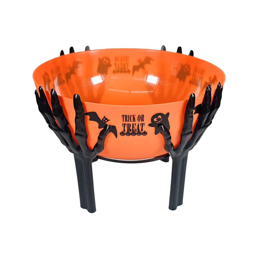 Recipiente para dulce con manos de calavera